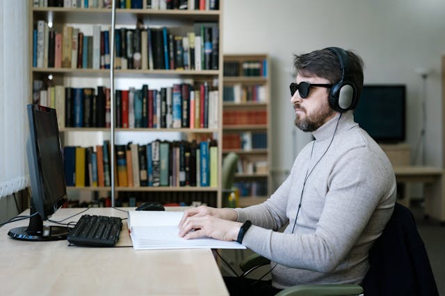 blind male at a computer